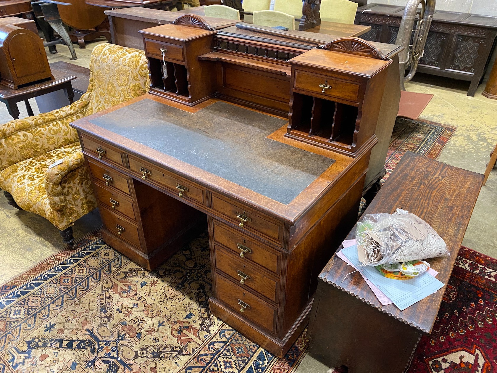 A late Victorian walnut pedestal desk, length 122cm, depth 70cm, height 114cm